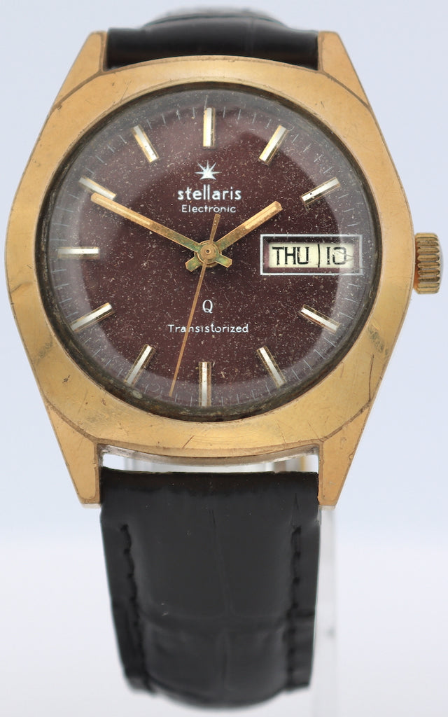Vintage Stellaris Brown Sunburst Day Date Men's Electronic Wristwatch Gold Tone