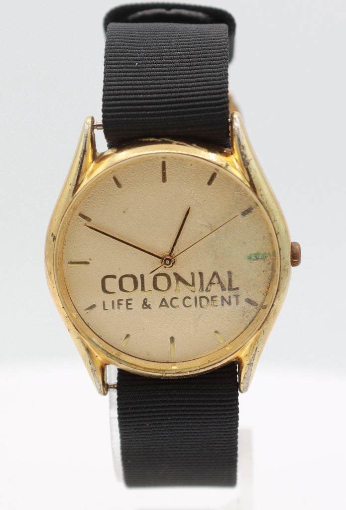 Vintage G.T.I. Colonial Life & Accident Men's Quartz Wristwatch Gold Tone